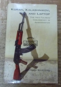 Koran, Kalashnikov and Laptop.  GIUSTOZZI